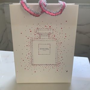 Chanel authentic shopping bag w/ beautiful ribbon.